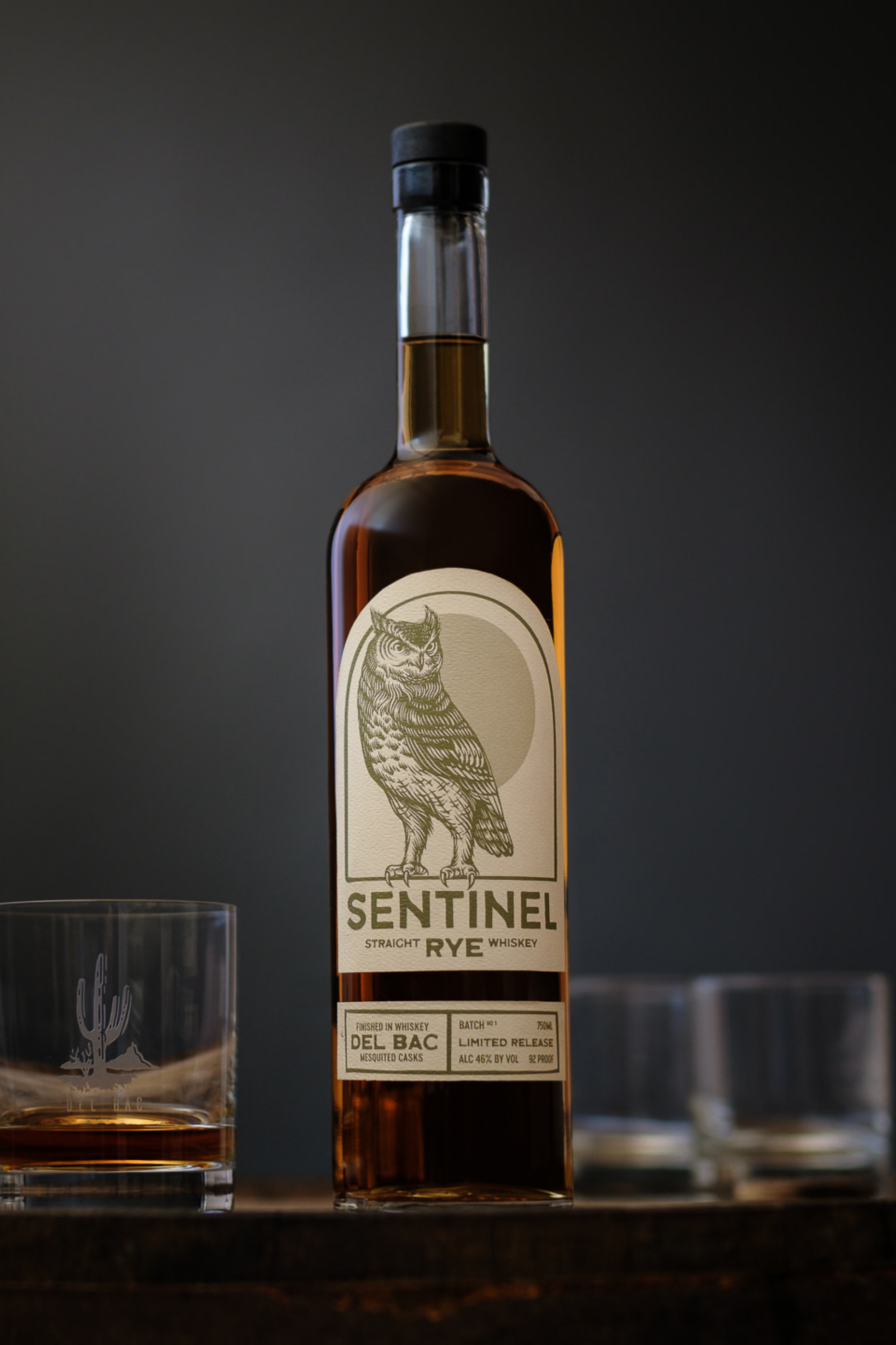 Sentinel is a straight rye whiskey finished in a mesquited cask and filtered over mesquite charcoal. 